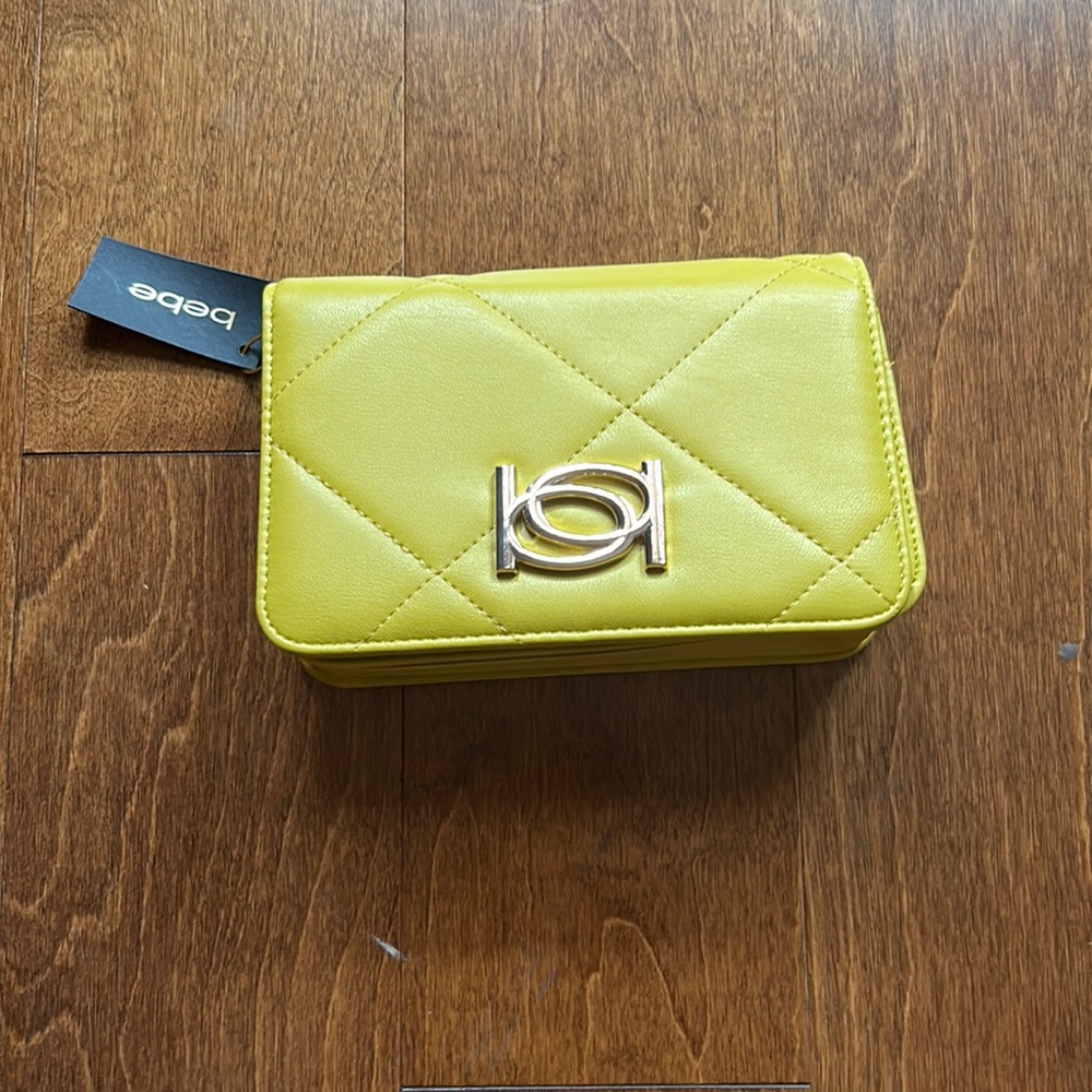 bebe yellow purse never used